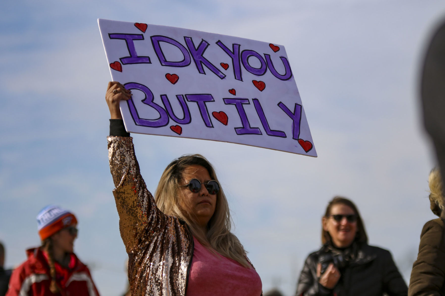 “IDK you but ILY” sign